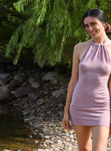 Beautiful brunette Adriana in sexy dress flashing her wonderful body by the river